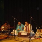 Rishi performing in Hampstead Town Hall, part of Rabishikha's (School of Rabindrasangeet, London)